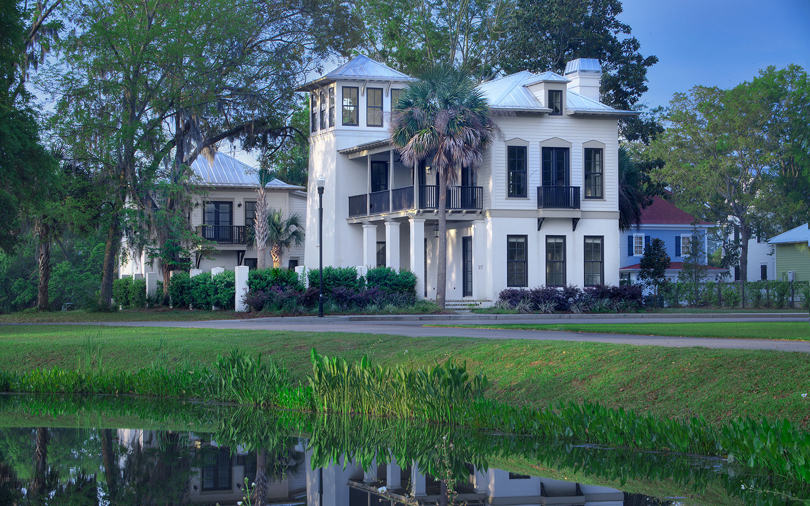 Minimalism Meets Tradition home by WaterMark Coastal Homes